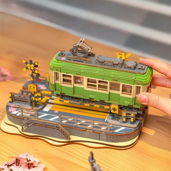 DIY Sakura train model, 3D wooden train puzzle, Japanese train model, Sakura train scene, wooden train kit, LED train model, DIY Japanese train puzzle, Sakura journey puzzle, wooden puzzle kit, collectible train model, wooden model kit with lights, DIY scenic train kit, train station puzzle, Japanese cherry blossom model, interactive wooden train, DIY sakura scene, eco-friendly train puzzle